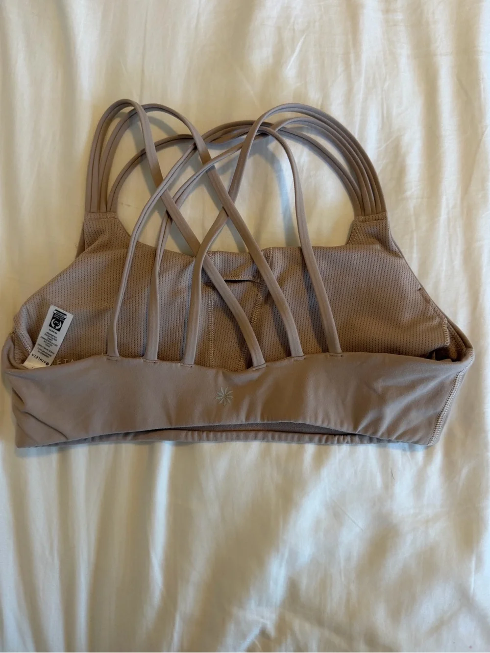 Athleta women’s strappy padded light purple mauve sports bra